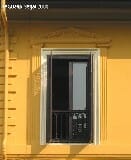 Window in yellow house