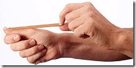 Hands pulling an elastic band
