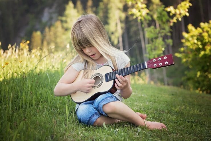 Girl playing guitar