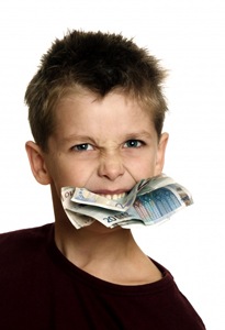 Boy with money notes in his mouth