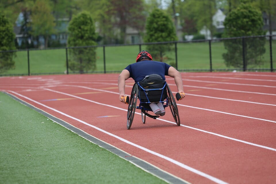 Man in wheelchair on athletics track