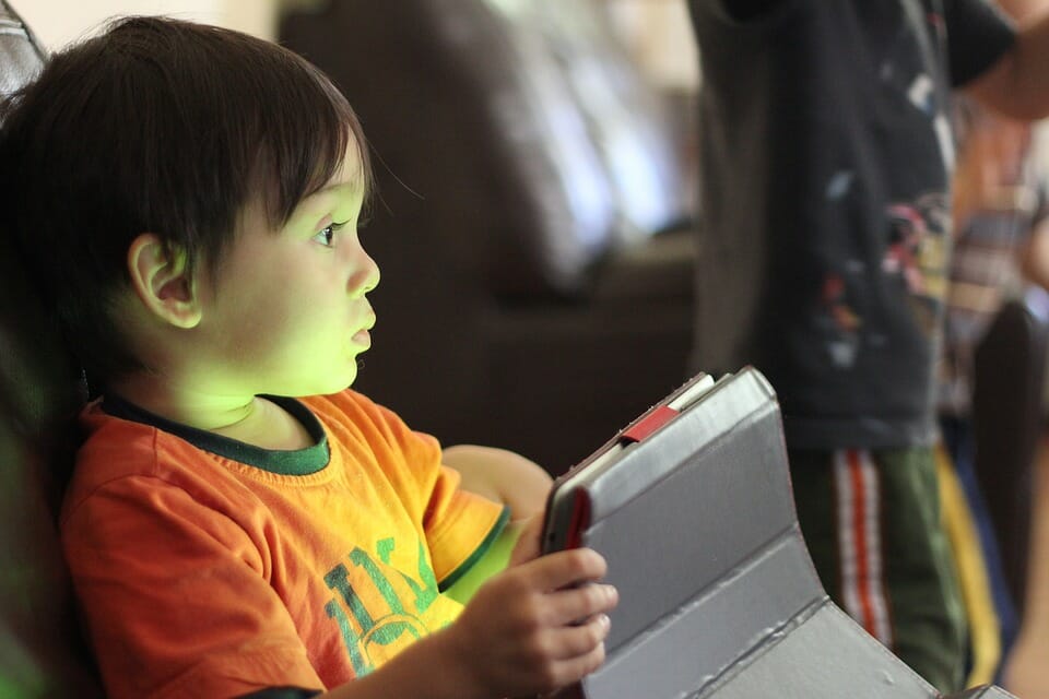 Little boy with a tablet computer