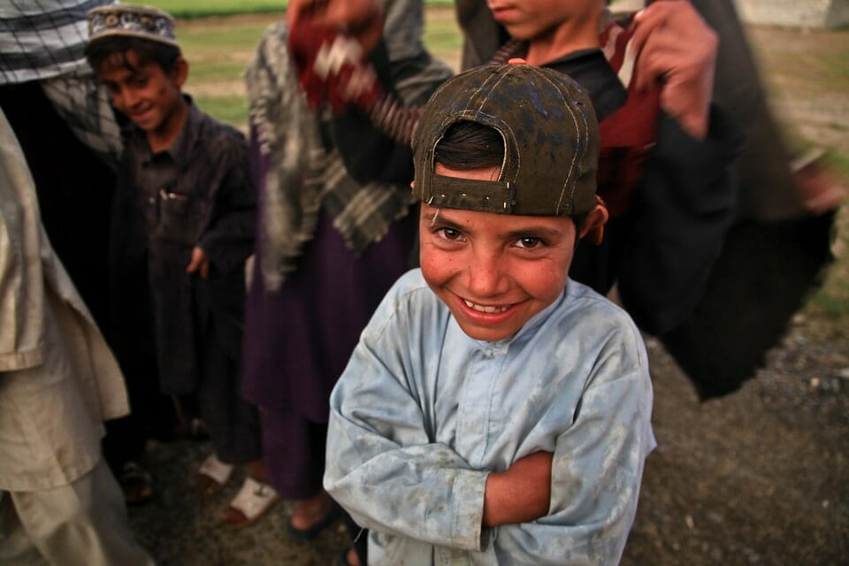 Happy poor Afghani boy