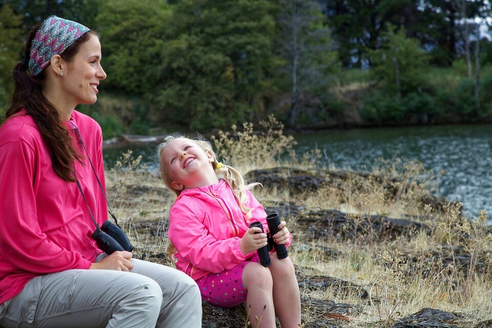 Mother and daughter happy outdoors