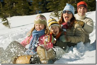 Family having fun in the snow