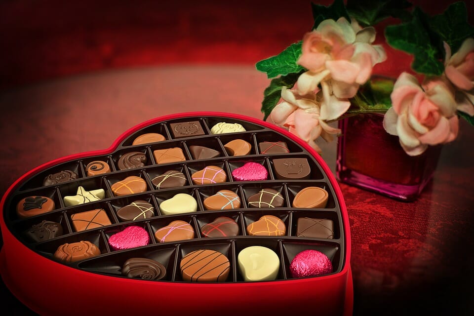 Box of chocolates and flowers for Valentine's Day