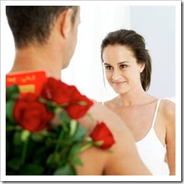 Man giving woman flowers
