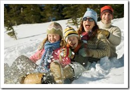 Family snow sledding