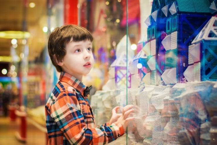 Boy at a toy store window