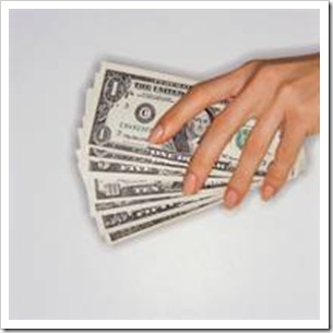 Hands with dollar notes