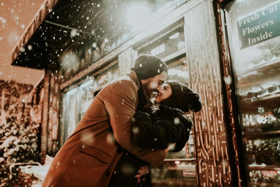 Couple kissing in the snow