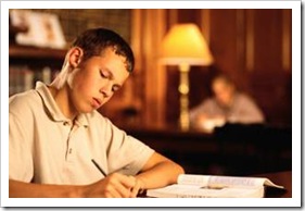 Teen boy studying