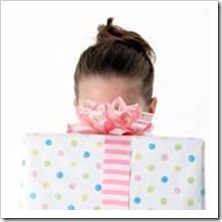 Girl behind a gift box