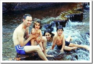Family on water fall