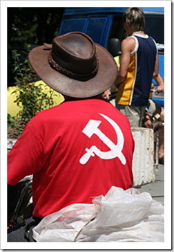 Man with Soviet symbol on red shirt