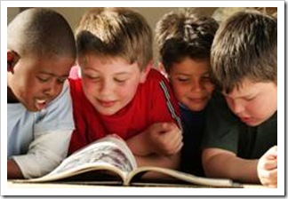 Group of kids reading a book