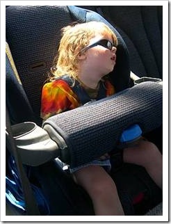 Kid sleeping in car seat