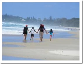 Family walking on the beach