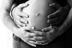 Hands on pregnant belly
