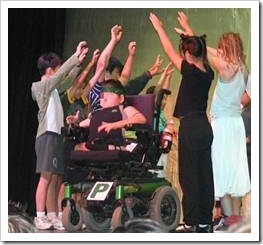 Disabled boy on stage