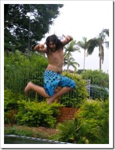 Happy boy bouncing on a trampoline