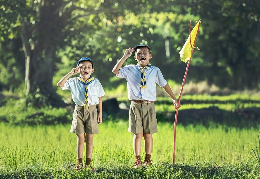 Proud scout boys with flag