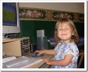 Little girl on the computer
