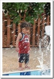 Boy in fountain