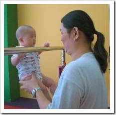 Mother and baby exercising