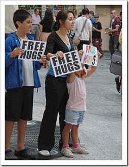 Our kids giving free hugs