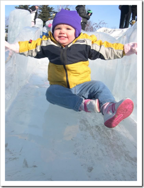 Toddler sliding on ice