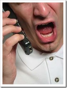 Man shouting on mobile phone