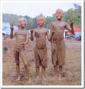 Kids covered in mud