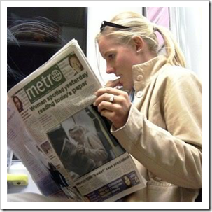 Woman reading the paper