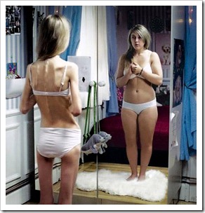 Anorexic girl seeing chubby girl in the mirror