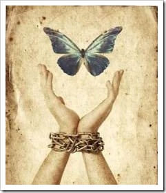 Hands letting go of butterfly