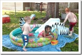 Children playing in a small pool