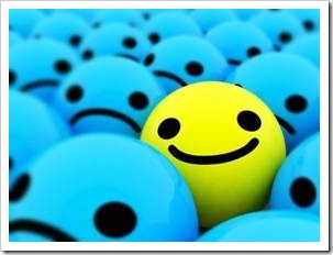 Yellow smiley in a sea of blue smilies