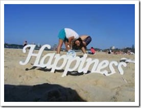 Happiness in the sand - sand can make you happy without money