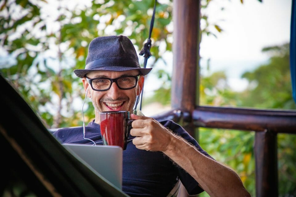 Man happy with cup of coffee
