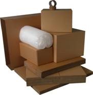 Different sizes of packing boxes and a bubble wrap roll