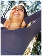 Teen stretching in the sunshine