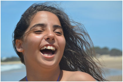 Teenage girl laughing