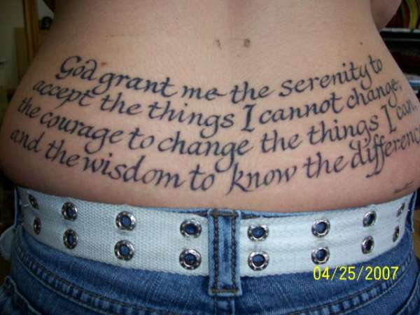 Serenity Prayer tattooed on a person's lower back
