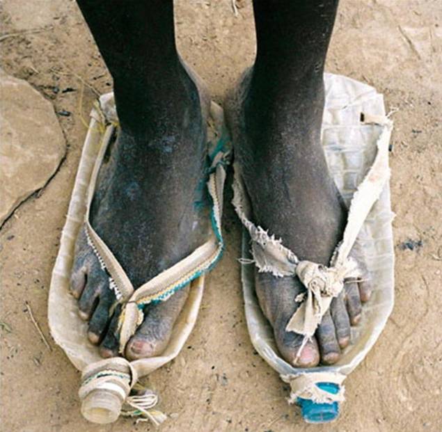 Shoes made from bottles on African feet