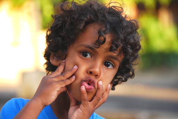 Boy looking worried. Worrying too often can be one of many stress symptoms