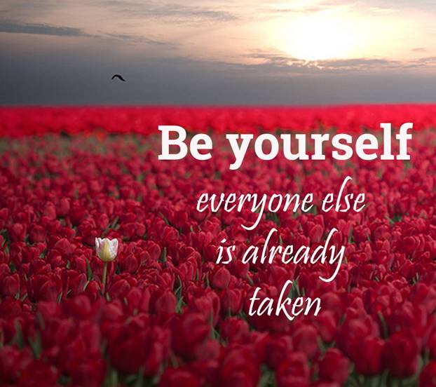 Be yourself everyone else is already taken written over a field of red flowers with a white flower sticking out