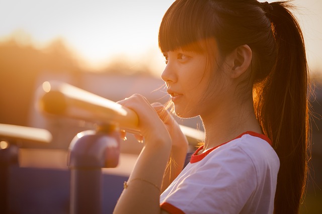 Young Asian girl at sunrise