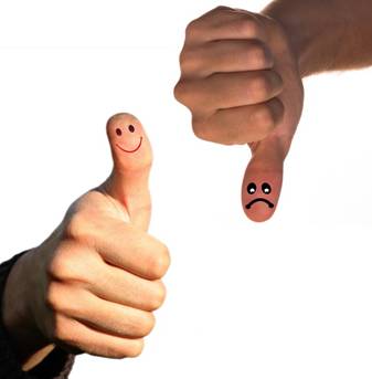 Smiling face on thumb up and sad face on thumb down