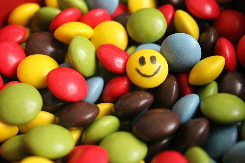 Chocolate candy with one smiling